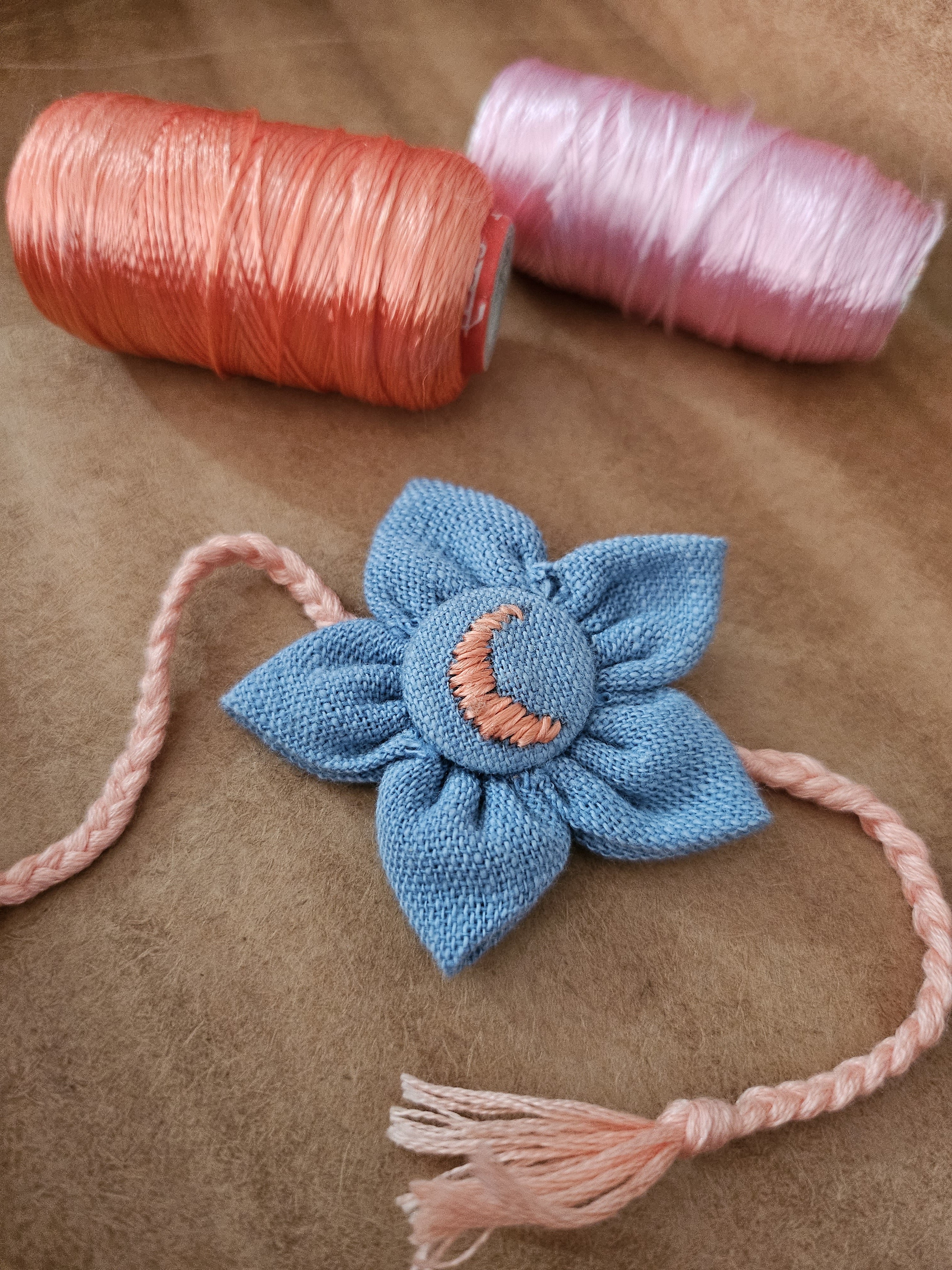 Light Blue Phulkari embroidered flower Rakhi & Upcycled Ikat Pouch (Set of 2)