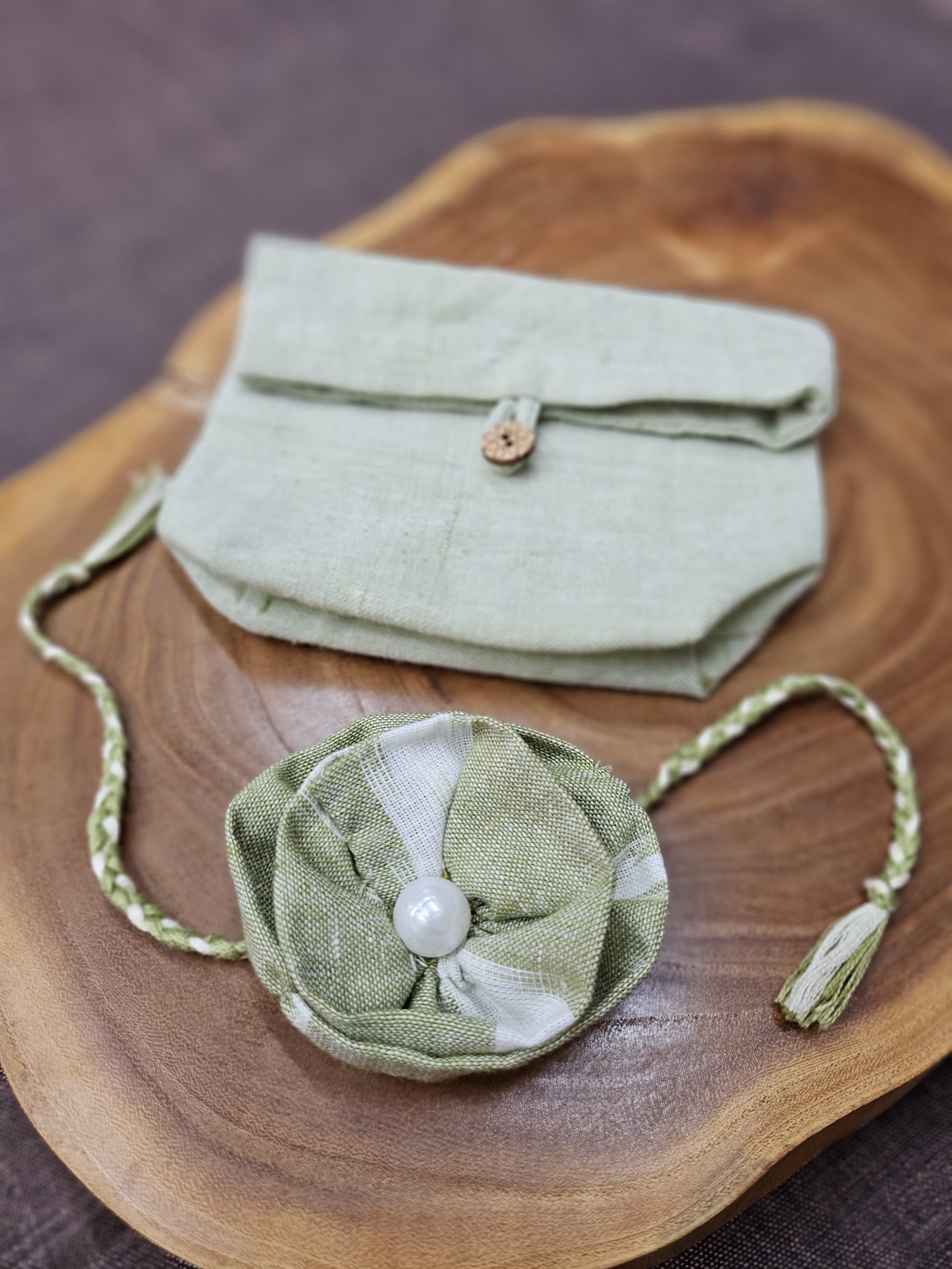 Green Ruffle Flower Rakhi & Upcycled Handwoven Pouch (Set of 2)