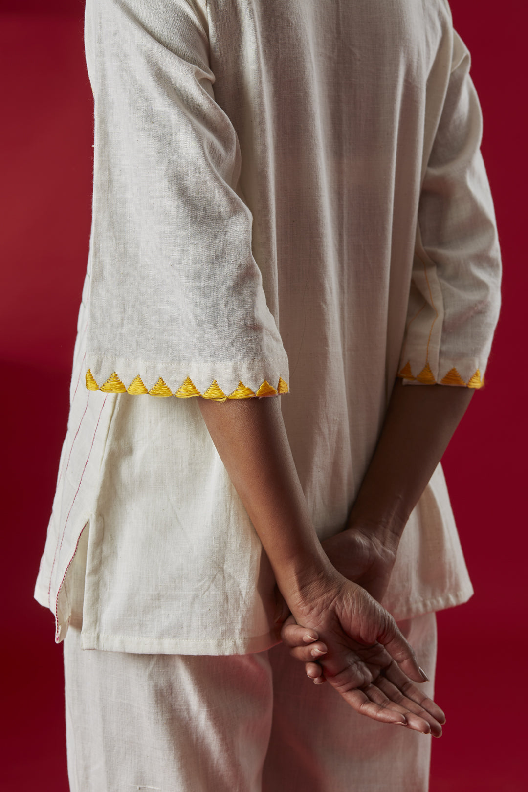 Trikon Multi-colored Phulkari Embroidery Top with Straight White Pants
