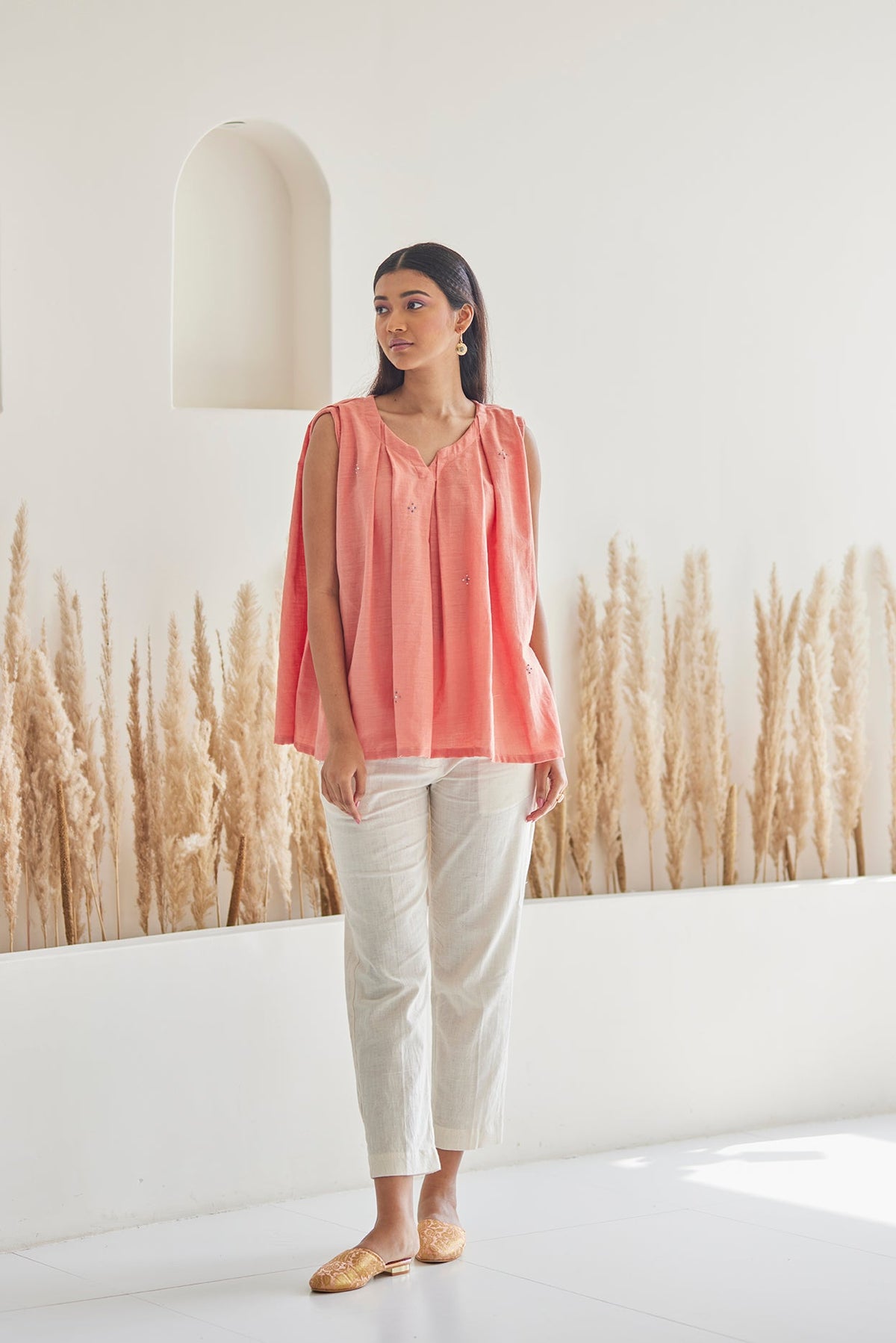 Embroidered Peach Top with White khaddar Pants