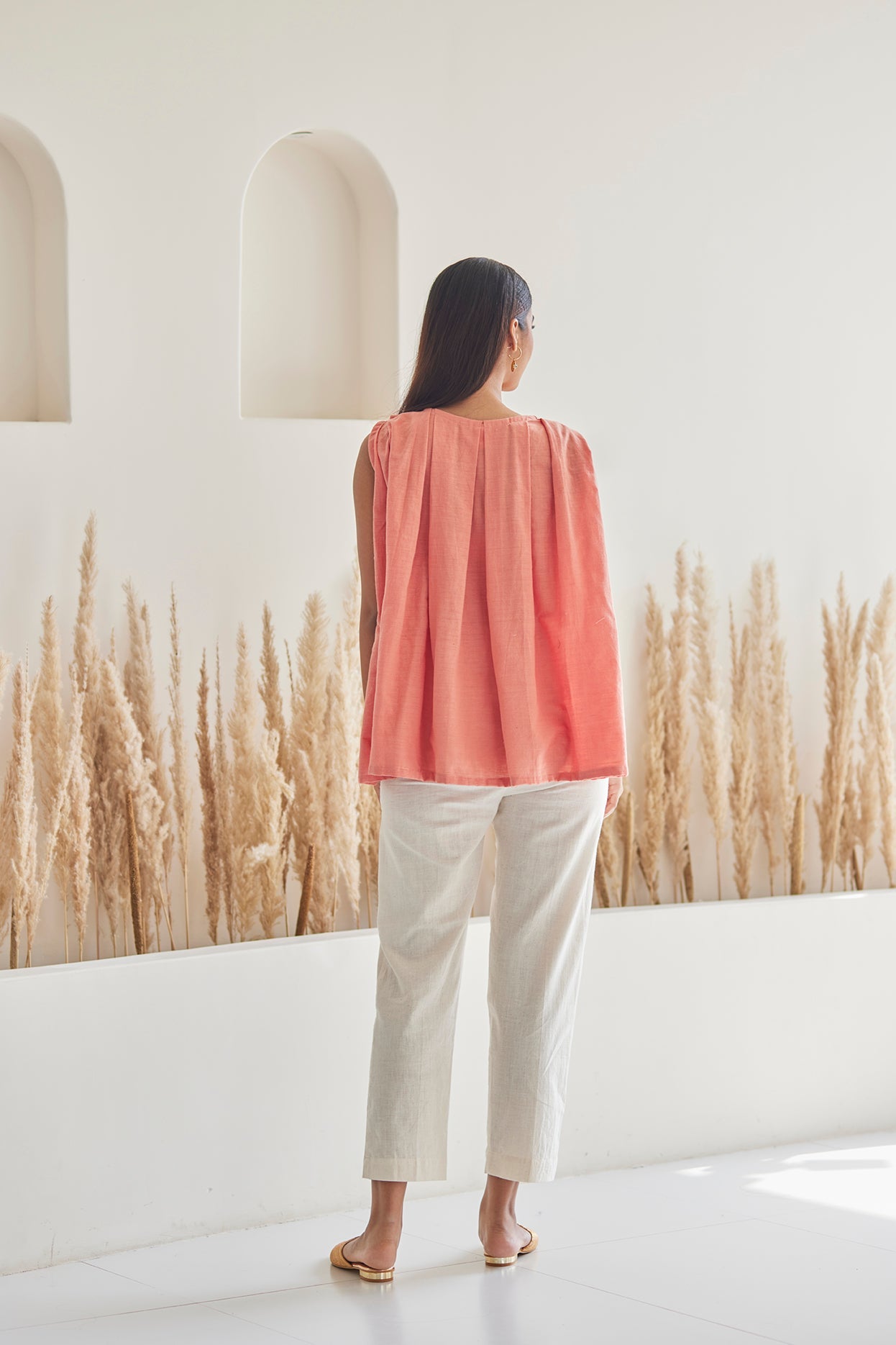 Embroidered Peach Top with White khaddar Pants