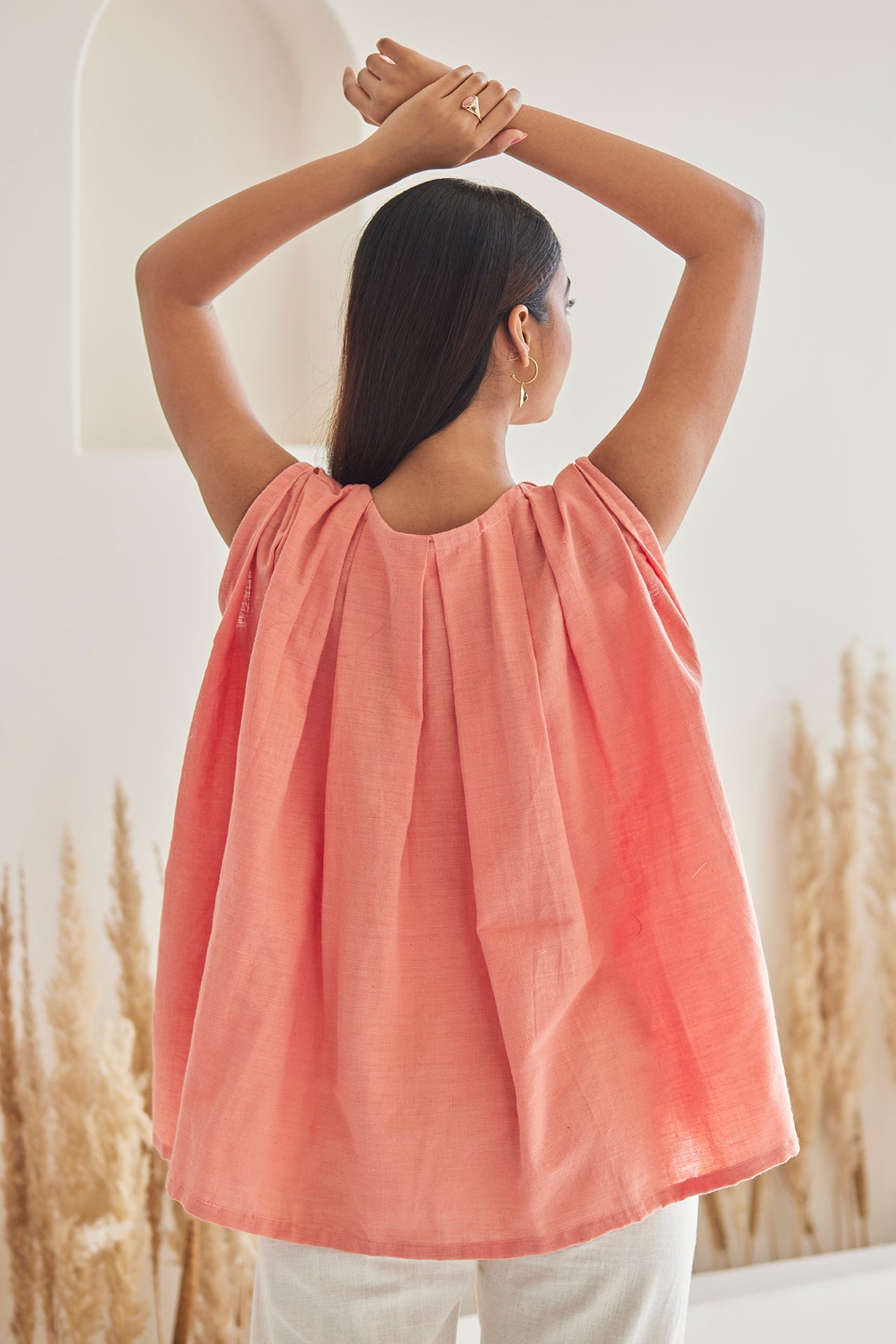 Embroidered Peach Top with White khaddar Pants