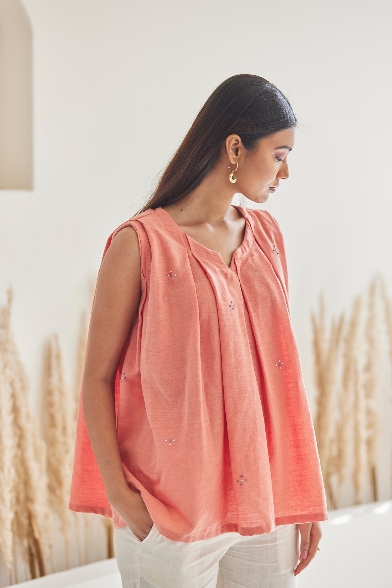 Embroidered Peach Top with White khaddar Pants