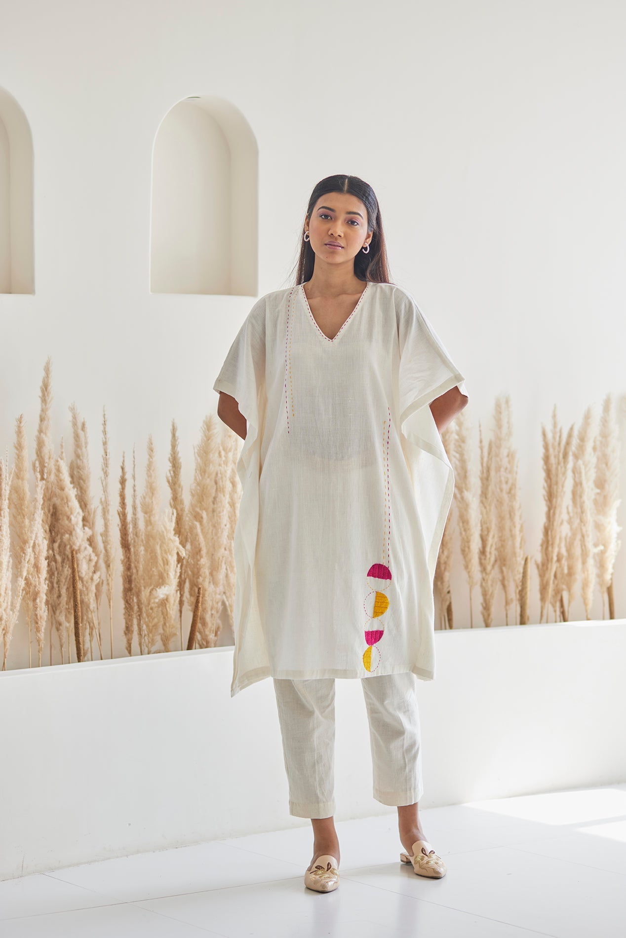 Embroidered white cotton Kaftan with white khaddar pants