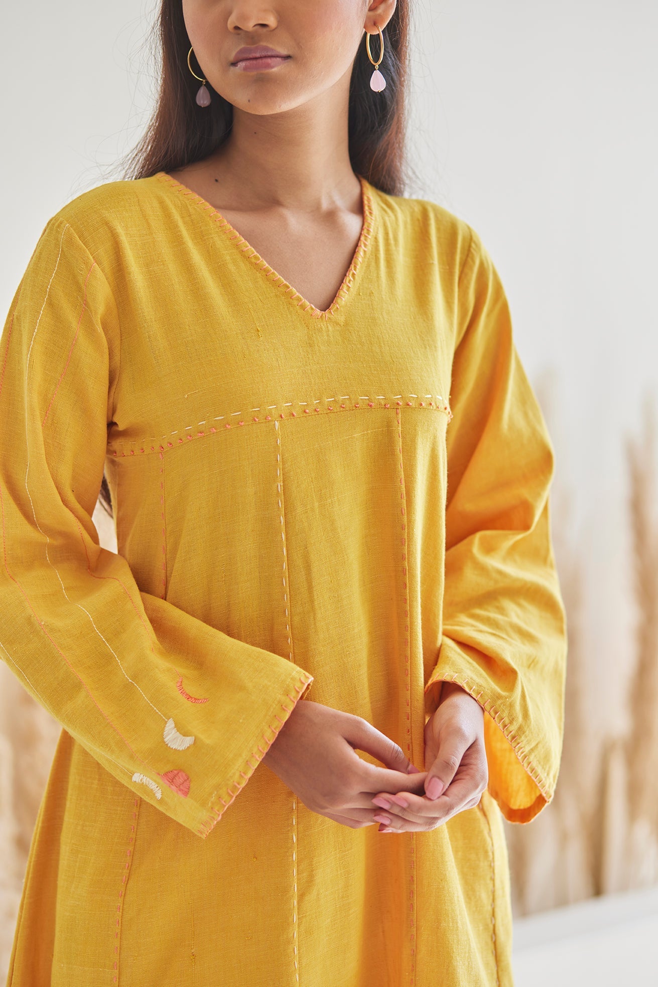 Flowy V-Neck Mustard Kurta with White khaddar Pants