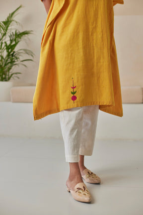 Phulkari hand-embroidered mustard kaftan with white khaddar pants