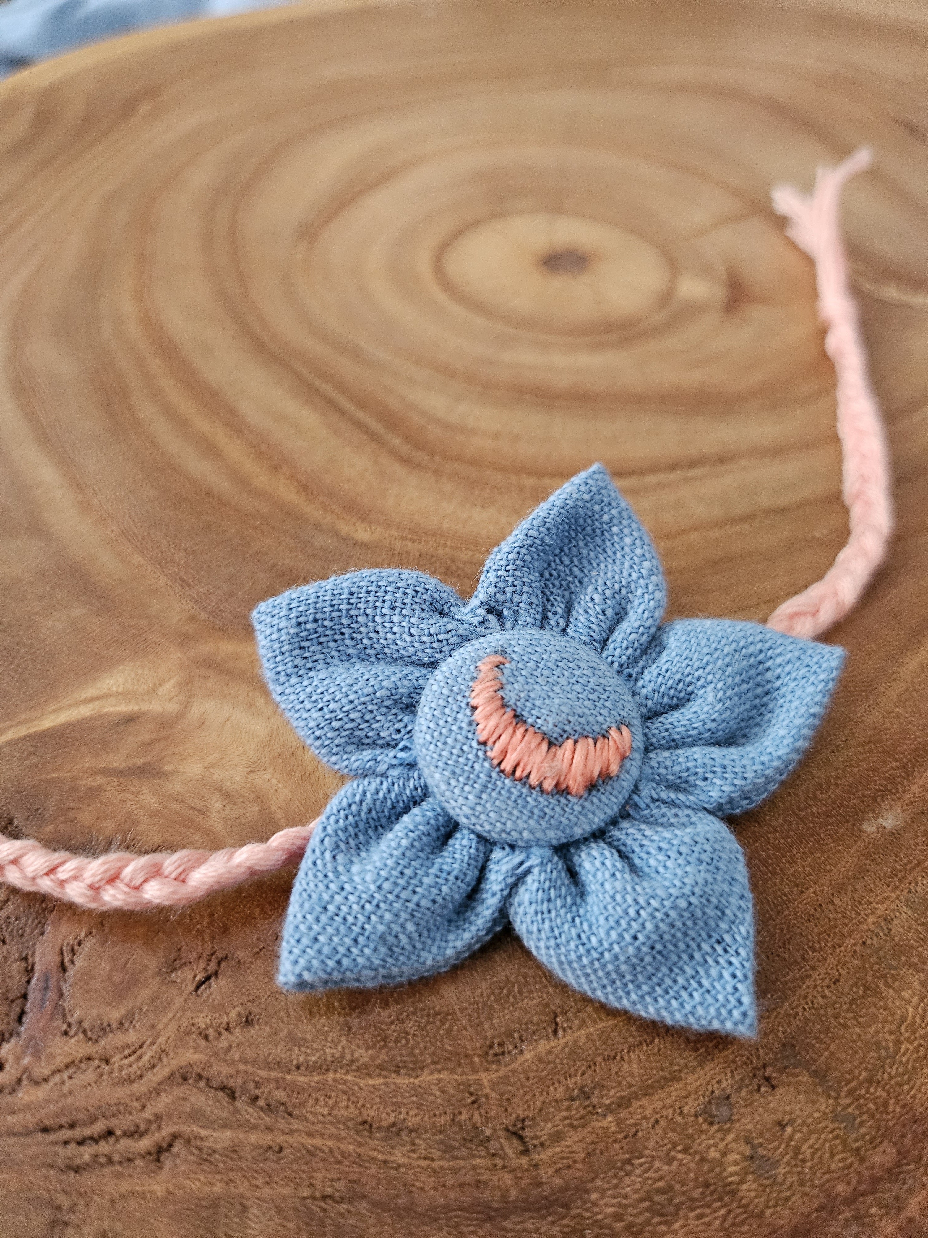 Light Blue Phulkari embroidered flower Rakhi & Upcycled Ikat Pouch (Set of 2)