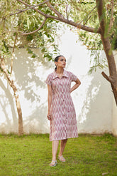 Pale Pink Dress with Embroidered Buttons